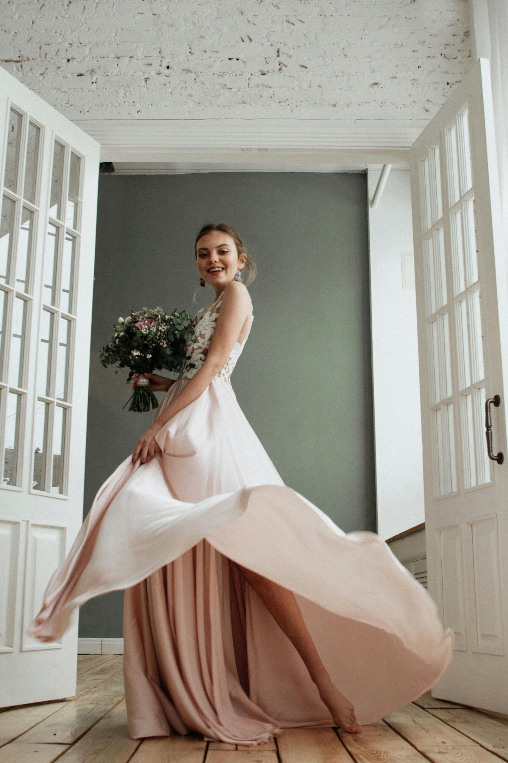 Woman Standing And Holding Bouquet